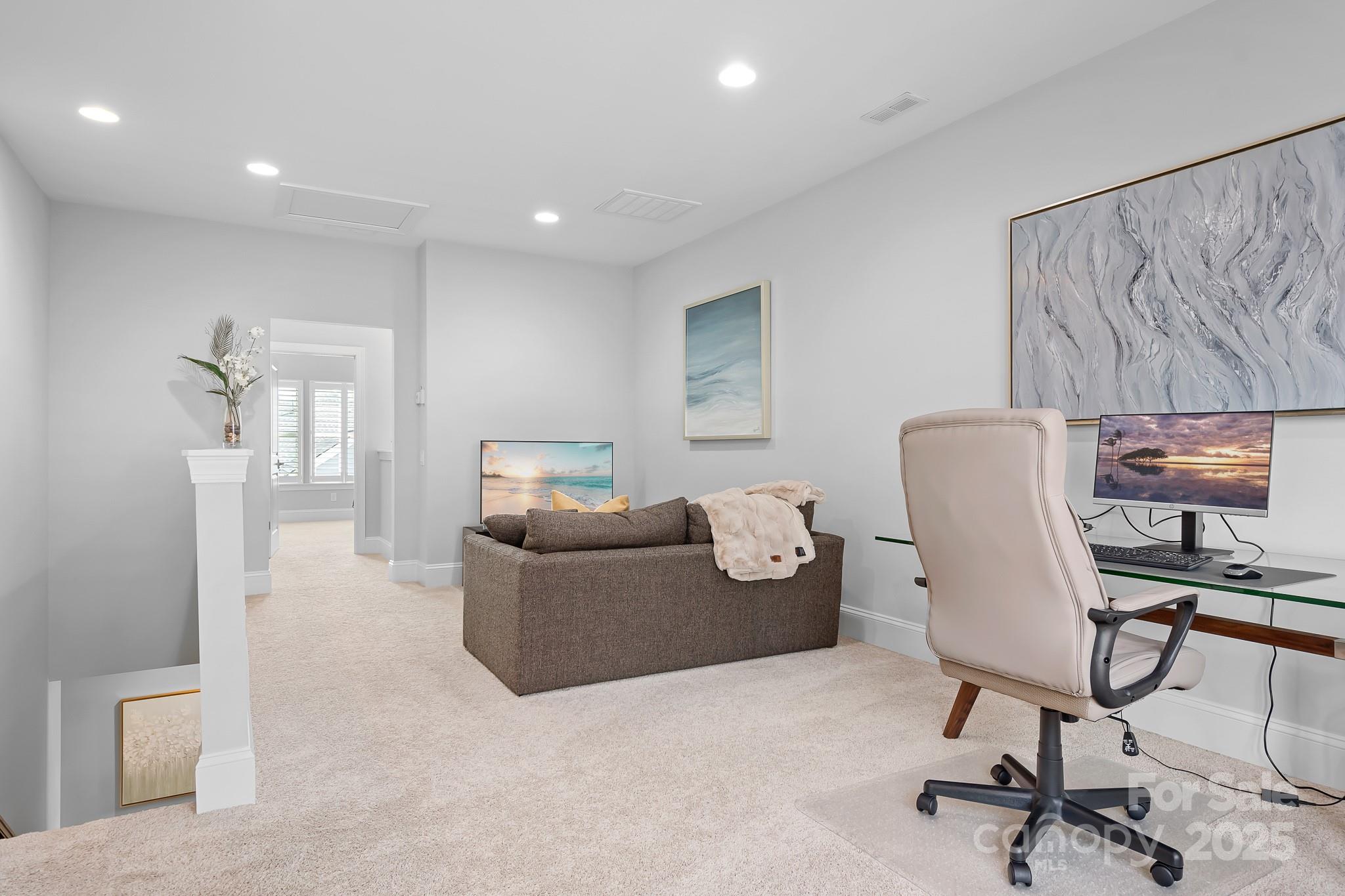 9223 Robbins Preserve Road Cornelius, NC 28031 - Photo 23 of 38 a view of workspace with furniture and screen