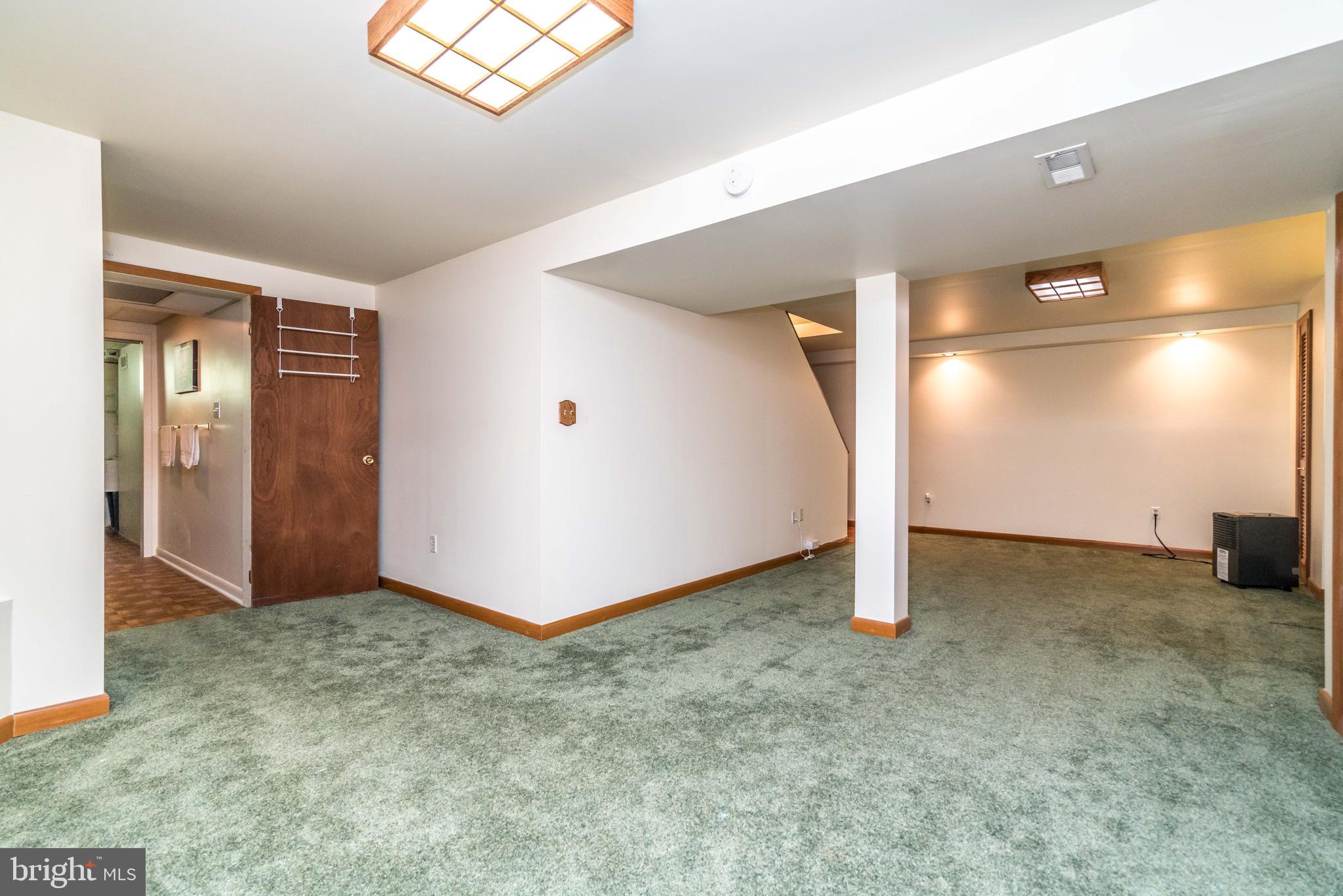 8702 Avondale Road Baltimore, MD 21234 - Photo 21 of 30 Basement Club Room