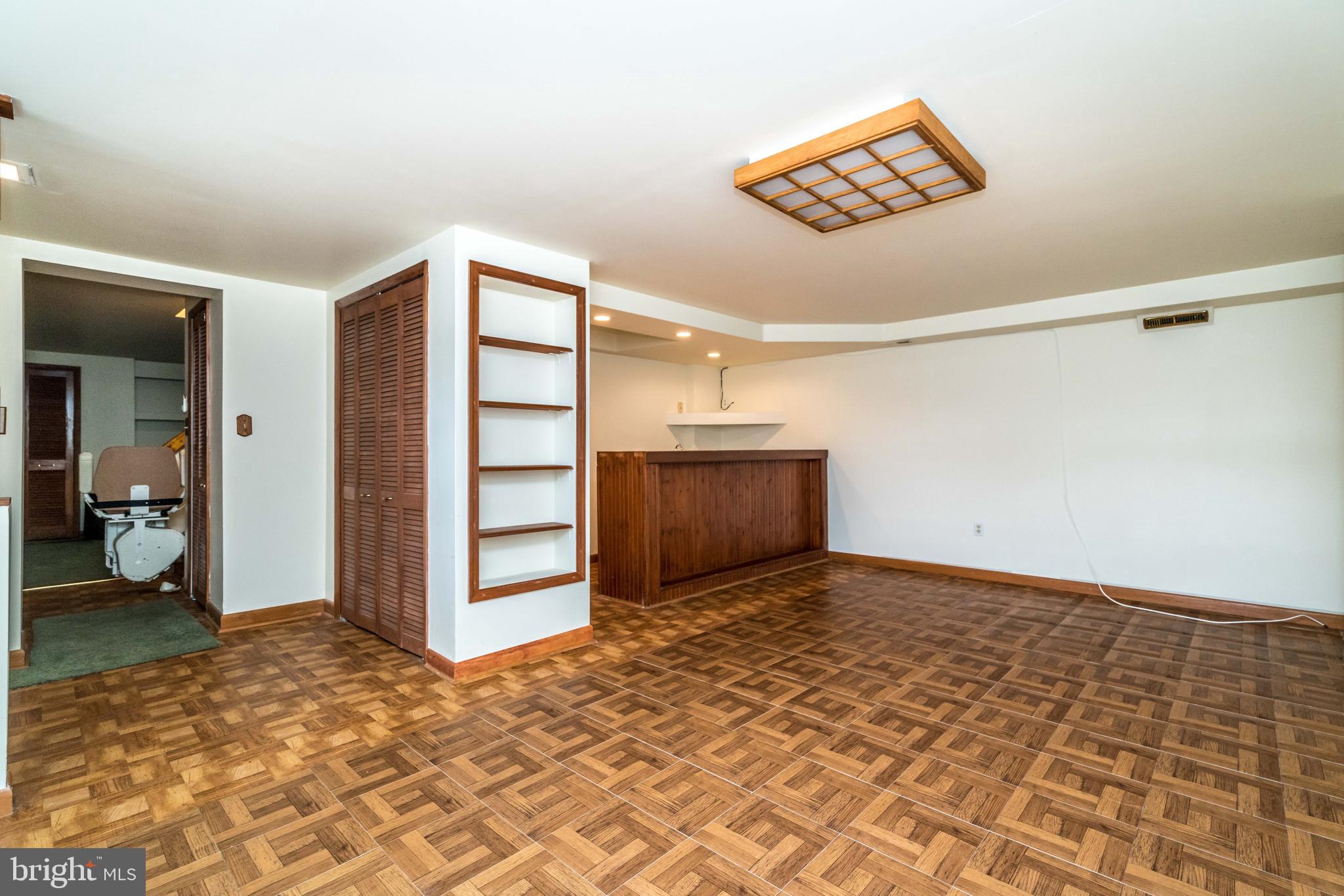 8702 Avondale Road Baltimore, MD 21234 - Photo 23 of 30 Basement Game Room with wet bar!