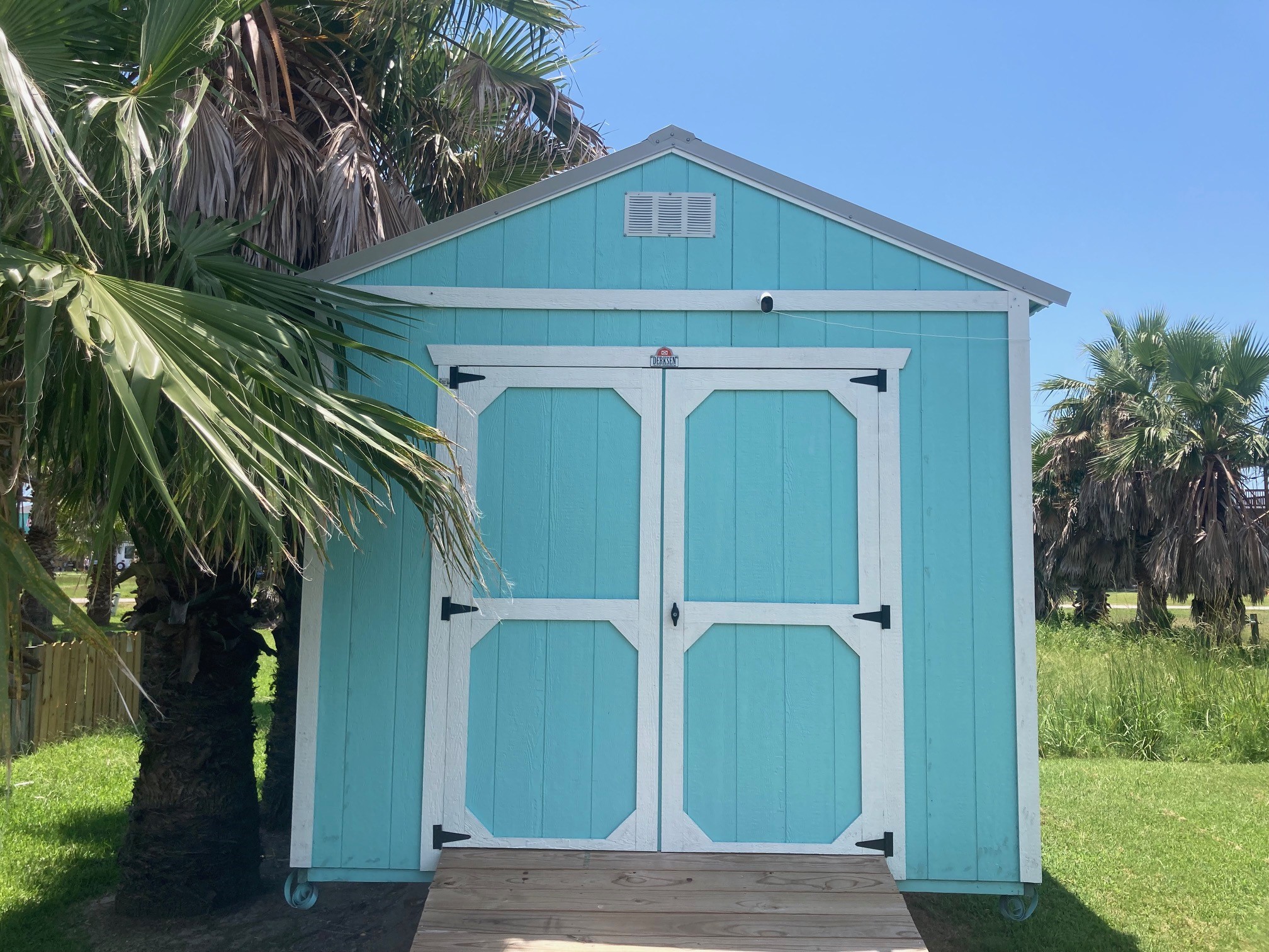 108 Mae Circle Crystal Beach, TX 77650 - Photo 17 of 22 a front view of a house with garden