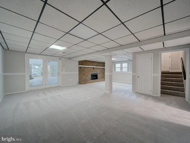 a view of empty room with a garage