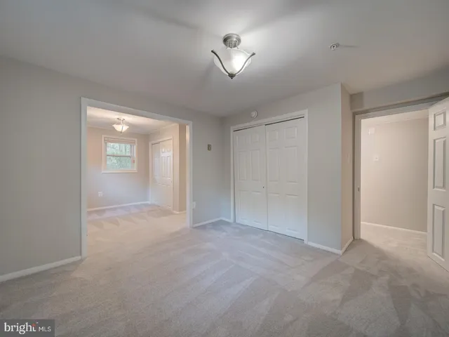 a bathroom with a shower sink and mirror