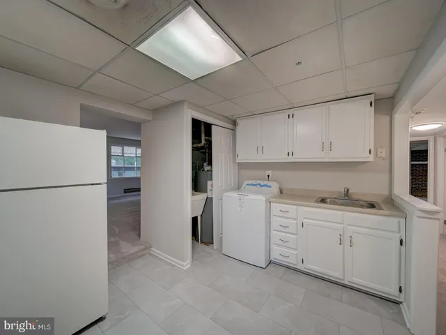 a view of empty room with windows