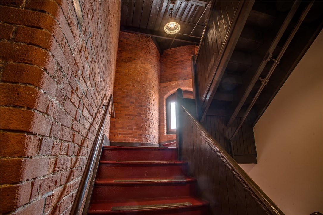 116 Chestnut Street, Unit J1 Providence, RI 02903 - Photo 21 of 22 Hallway view with beautifully exposed brick.