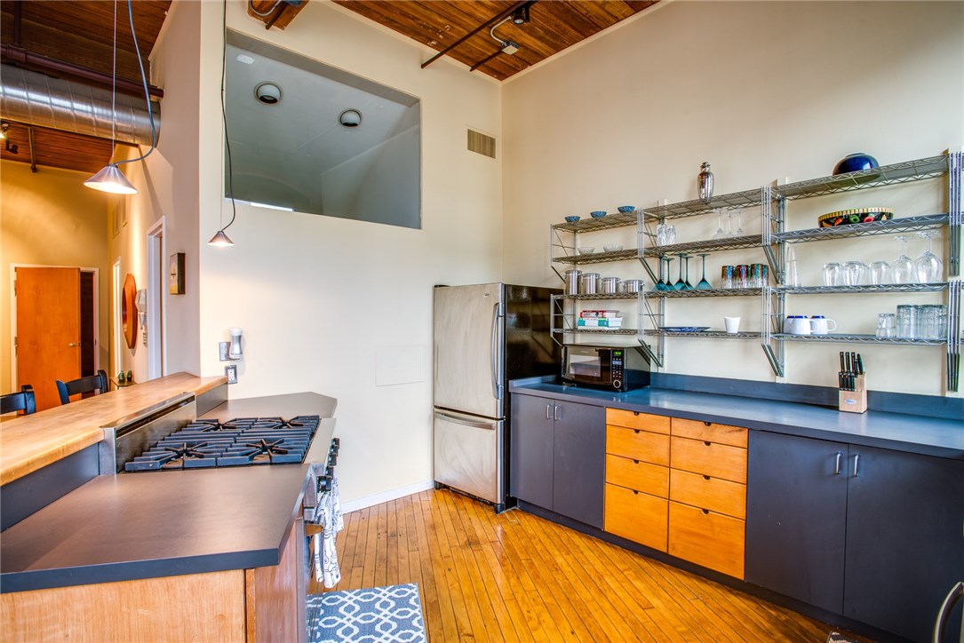 116 Chestnut Street, Unit J1 Providence, RI 02903 - Photo 6 of 22 Chef's kitchen with stainless steel appliances.