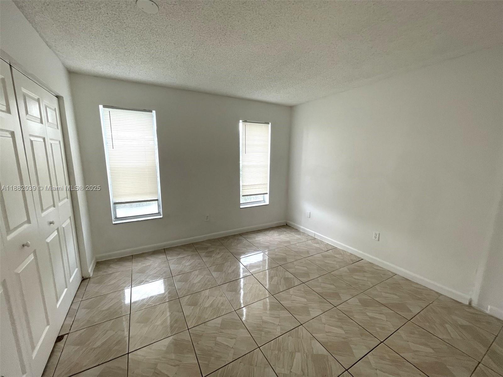2800 Northwest 56th Avenue, Unit A202 Lauderhill, FL 33313 - Photo 8 of 10 Bedroom 2