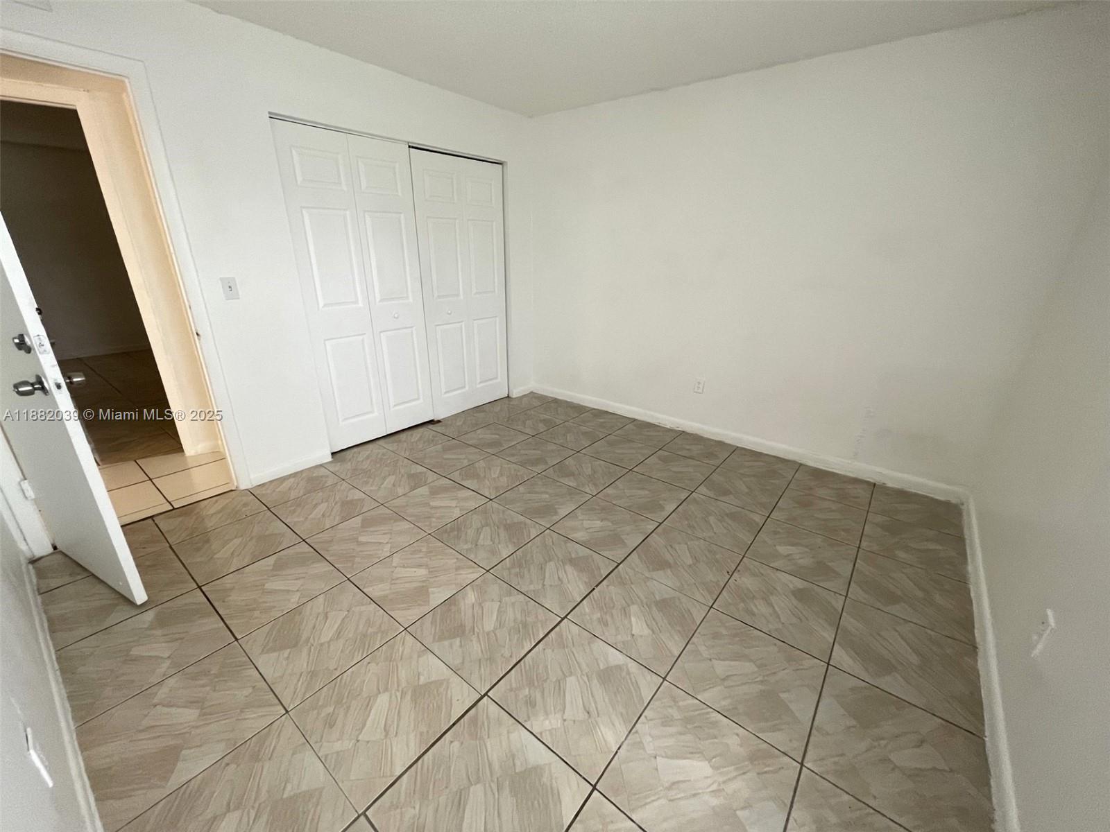 2800 Northwest 56th Avenue, Unit A202 Lauderhill, FL 33313 - Photo 9 of 10 Bedroom 3