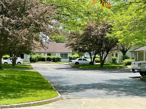 a view of a patio with a yard
