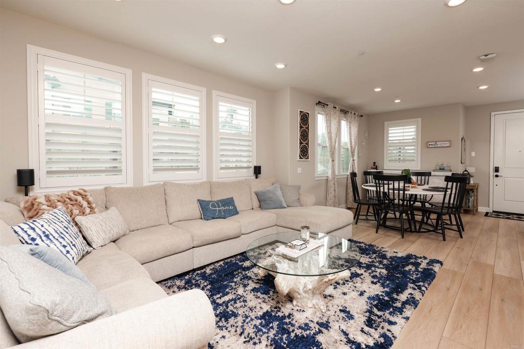 1112 Delpy View Point Vista, CA 92084 - Photo 13 of 62 a living room with furniture and a large window