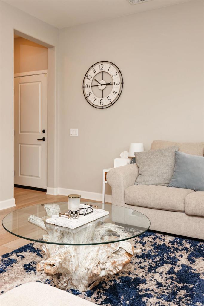 1112 Delpy View Point Vista, CA 92084 - Photo 15 of 62 a living room with couch and a dining table