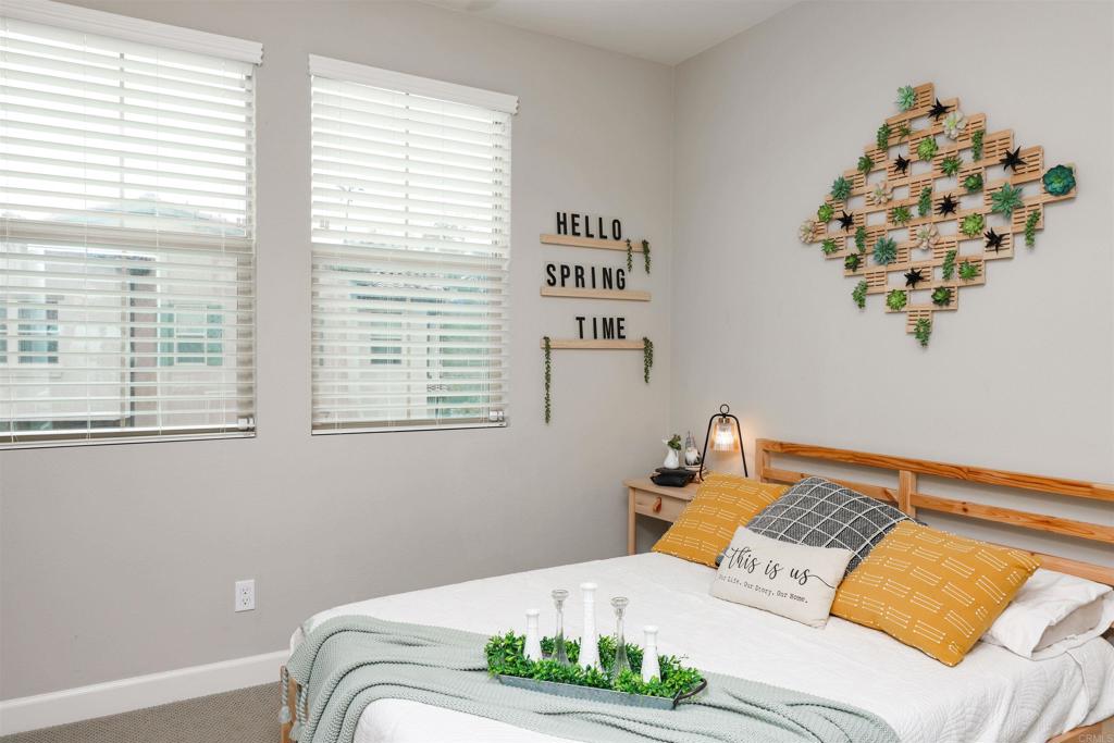 1112 Delpy View Point Vista, CA 92084 - Photo 20 of 62 a bedroom with a bed and a window