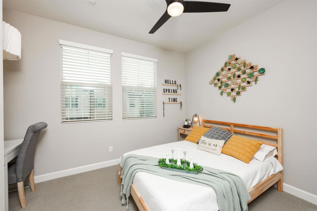 1112 Delpy View Point Vista, CA 92084 - Photo 21 of 62 a bedroom with bed and a window