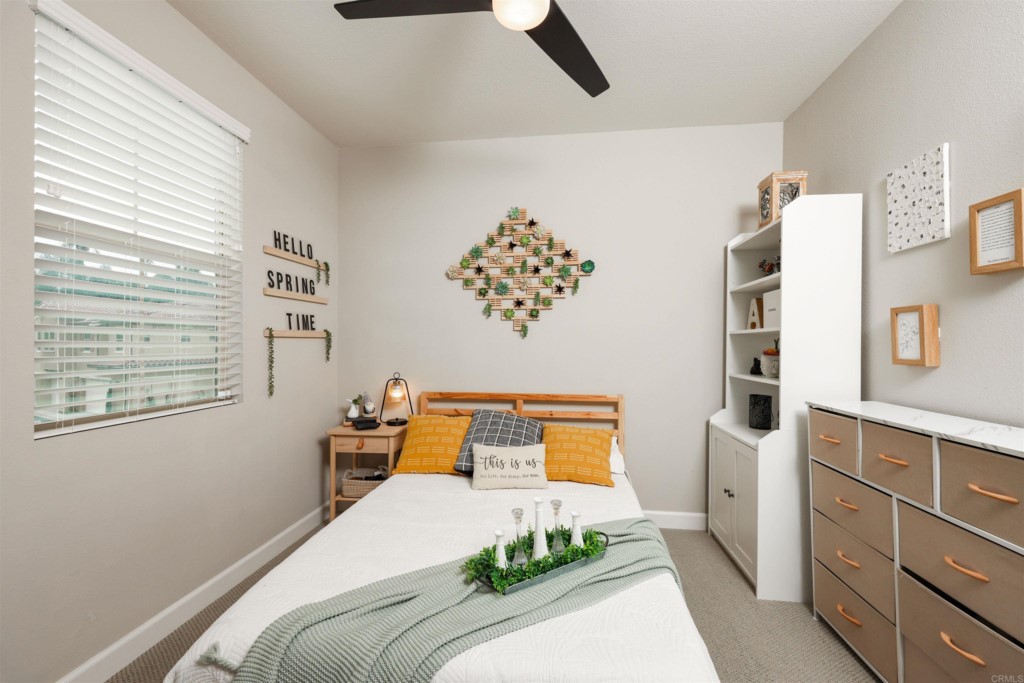 1112 Delpy View Point Vista, CA 92084 - Photo 29 of 62 a bedroom with bed and window