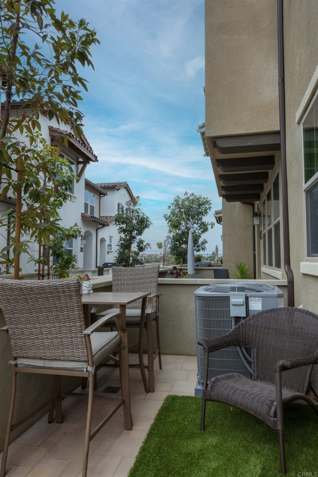 1112 Delpy View Point Vista, CA 92084 - Photo 42 of 62 a view of a patio with a table and chairs