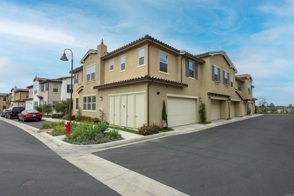 1112 Delpy View Point Vista, CA 92084 - Photo 46 of 62 front view of a house with a street