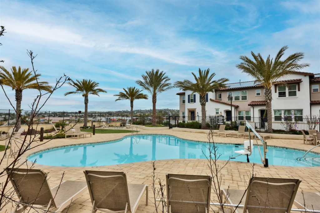 1112 Delpy View Point Vista, CA 92084 - Photo 53 of 62 a view of a swimming pool with a lounge chair