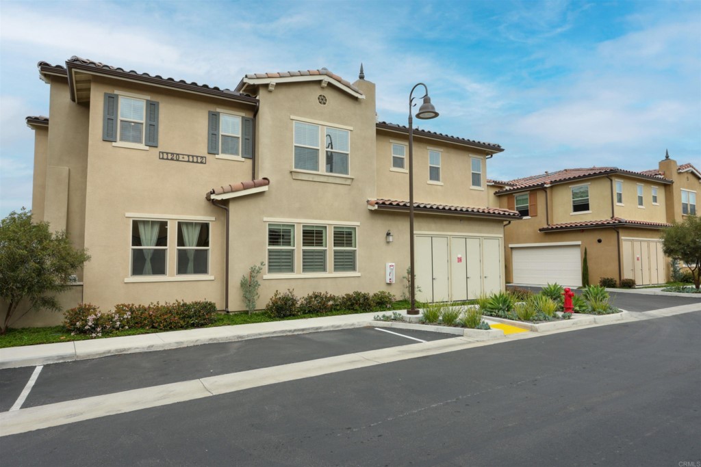 1112 Delpy View Point Vista, CA 92084 - Photo 62 of 62 a front view of a house with a yard