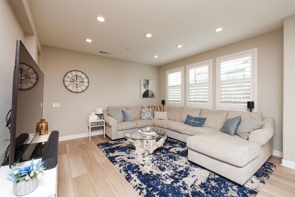 1112 Delpy View Point Vista, CA 92084 - Photo 10 of 62 a living room with furniture and a large window