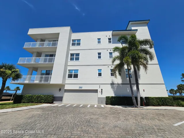 a bedroom with a bed and furniture in it