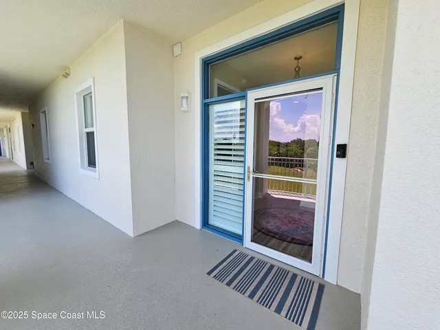 a bathroom with a sink a toilet a shower and a mirror
