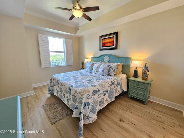 a bedroom with a bed and a walk in closet