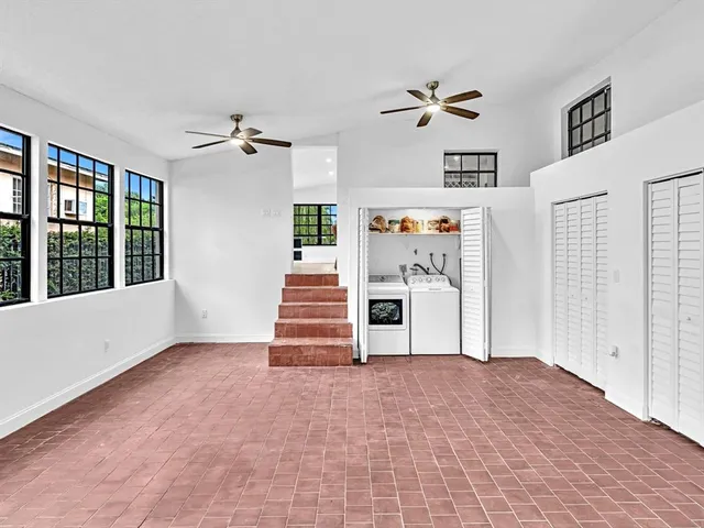 a bathroom with a sink a mirror and shower