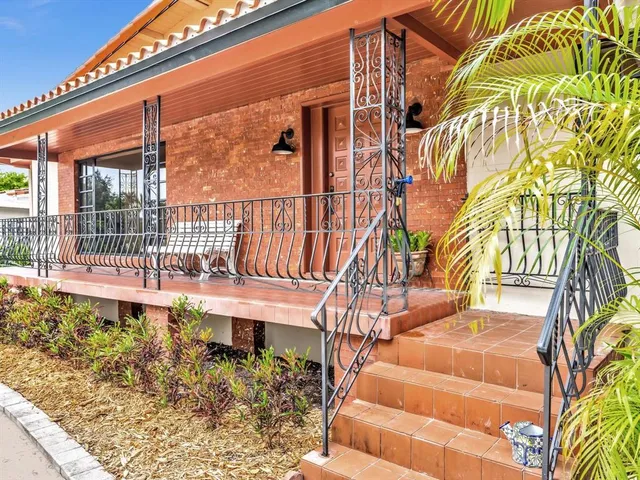 a view of a house with a balcony
