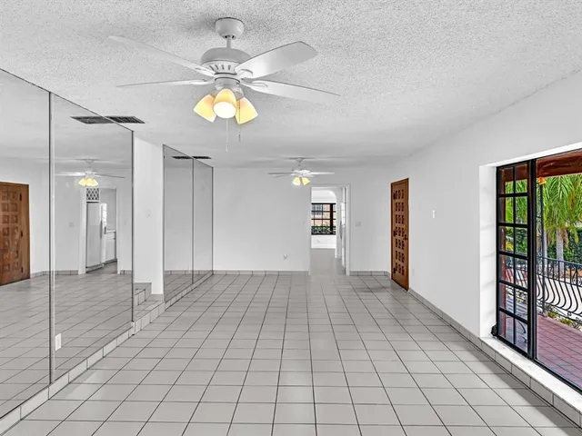 a kitchen with a sink and a stove top oven