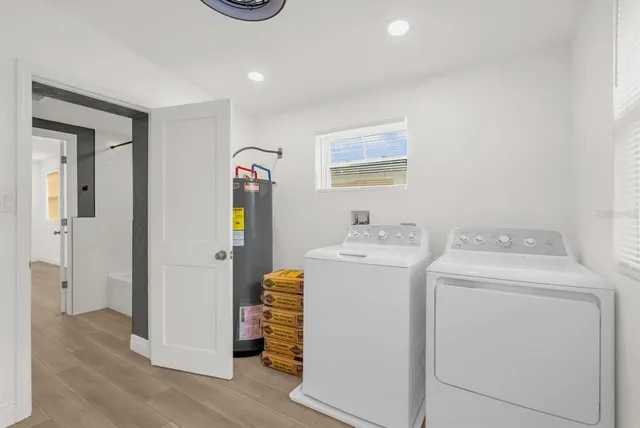 a utility room with dryer and washer