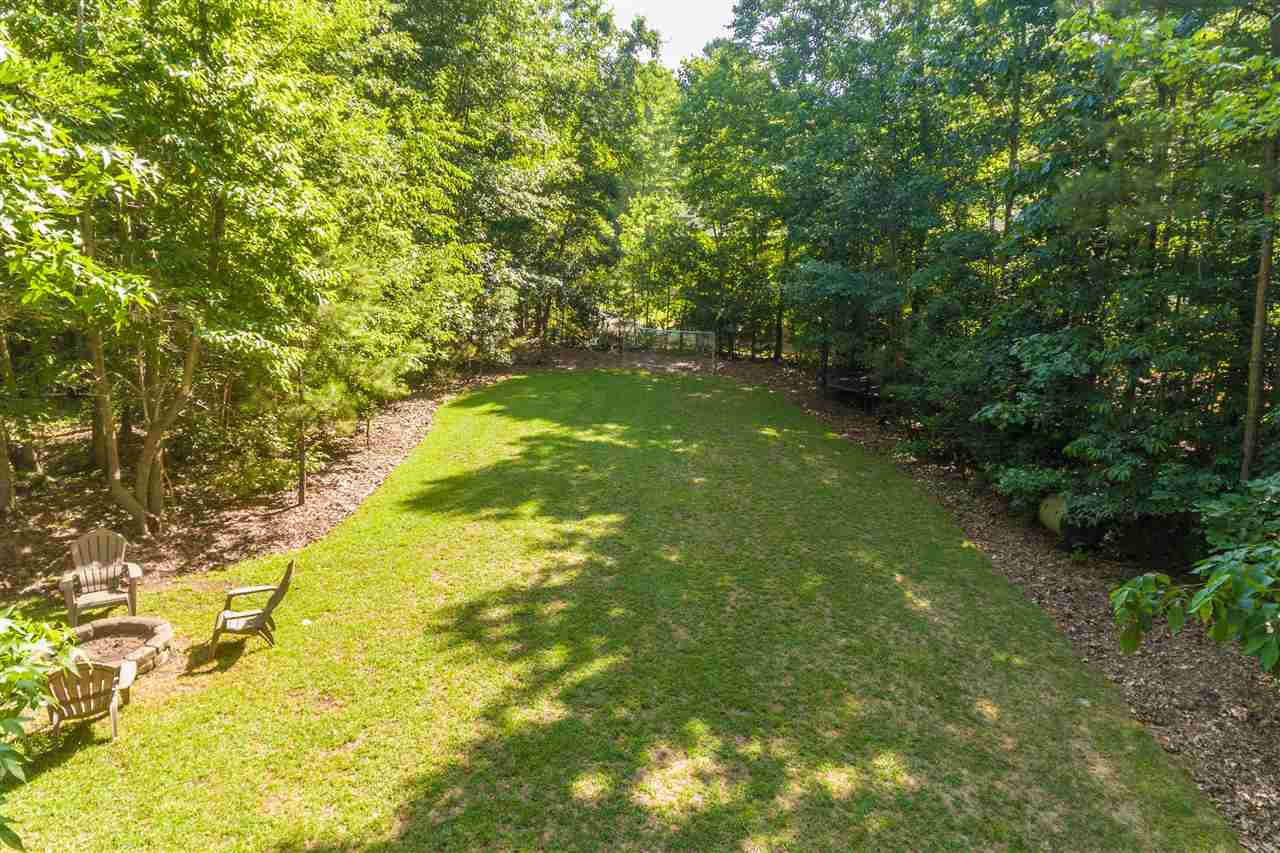 7313 Duncans Ridge Way Fuquay-Varina, NC 27526 - Photo 29 of 30 Plenty of room to run around in this backyard! Exterior Back