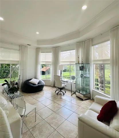 a living room with furniture and a table