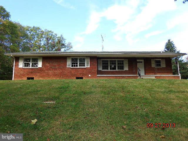 13126 Draper Road Clear Spring, MD 21722 - Photo 1 of 30 a front view of house with yard and green space