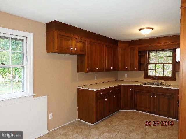 13126 Draper Road Clear Spring, MD 21722 - Photo 11 of 30 a kitchen with a sink and cabinets