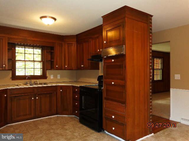 13126 Draper Road Clear Spring, MD 21722 - Photo 12 of 30 a kitchen with a sink and cabinets