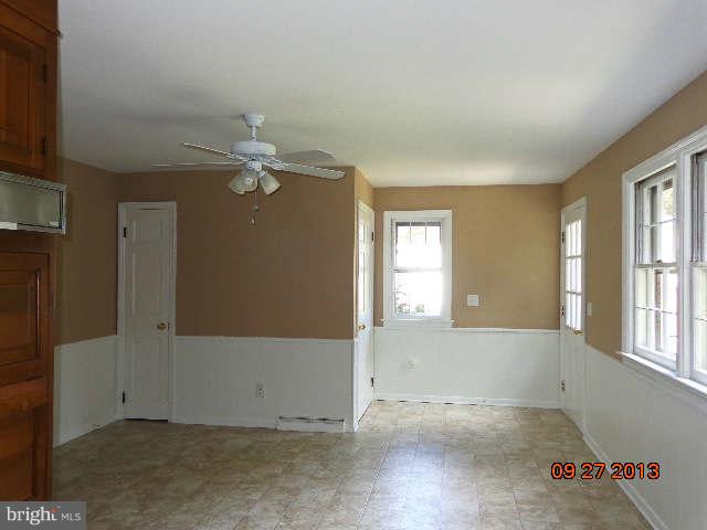 13126 Draper Road Clear Spring, MD 21722 - Photo 8 of 30 an empty room with windows and entrance