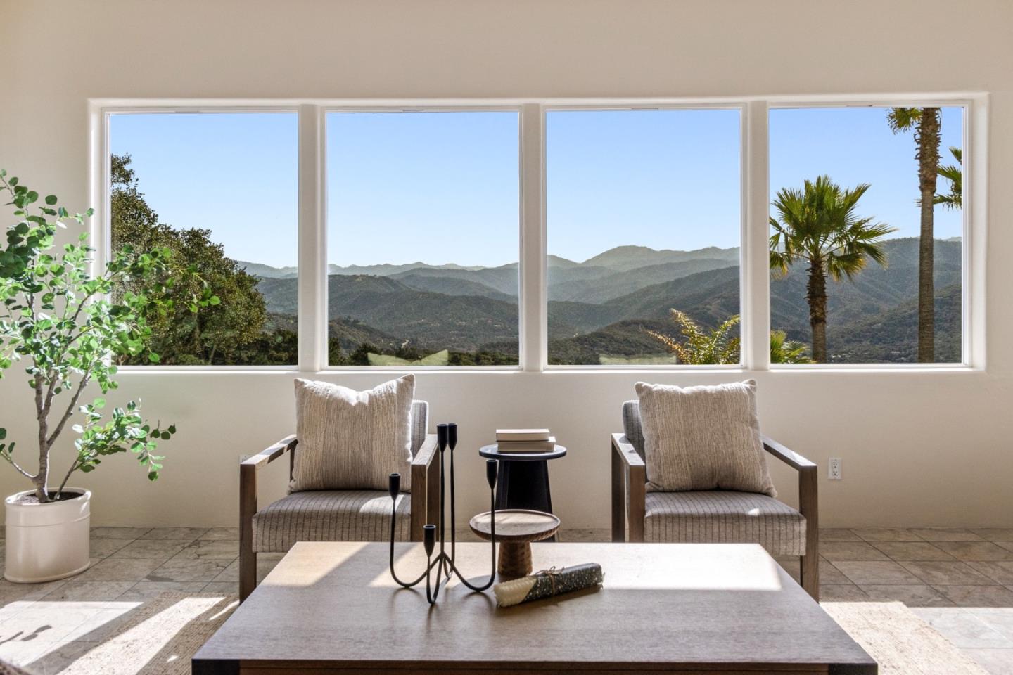 320 El Caminito Road Carmel Valley, CA 93924 - Photo 14 of 62 a living room with patio furniture and a potted plant