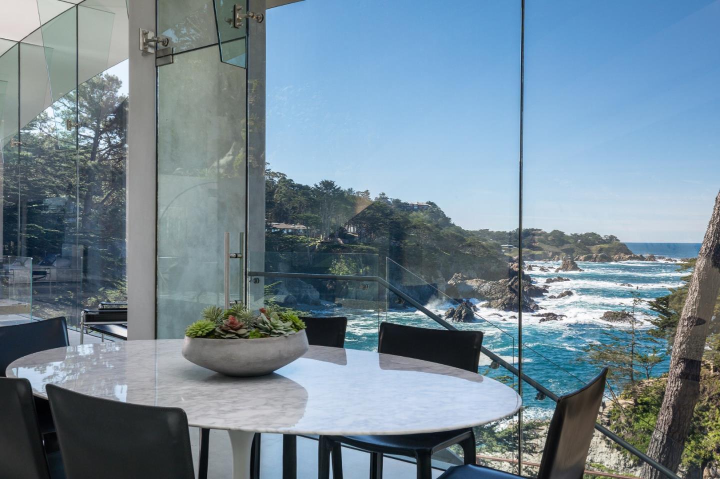 243 Highway 1 Carmel, CA 93923 - Photo 15 of 20 a view of a balcony dining table and chairs