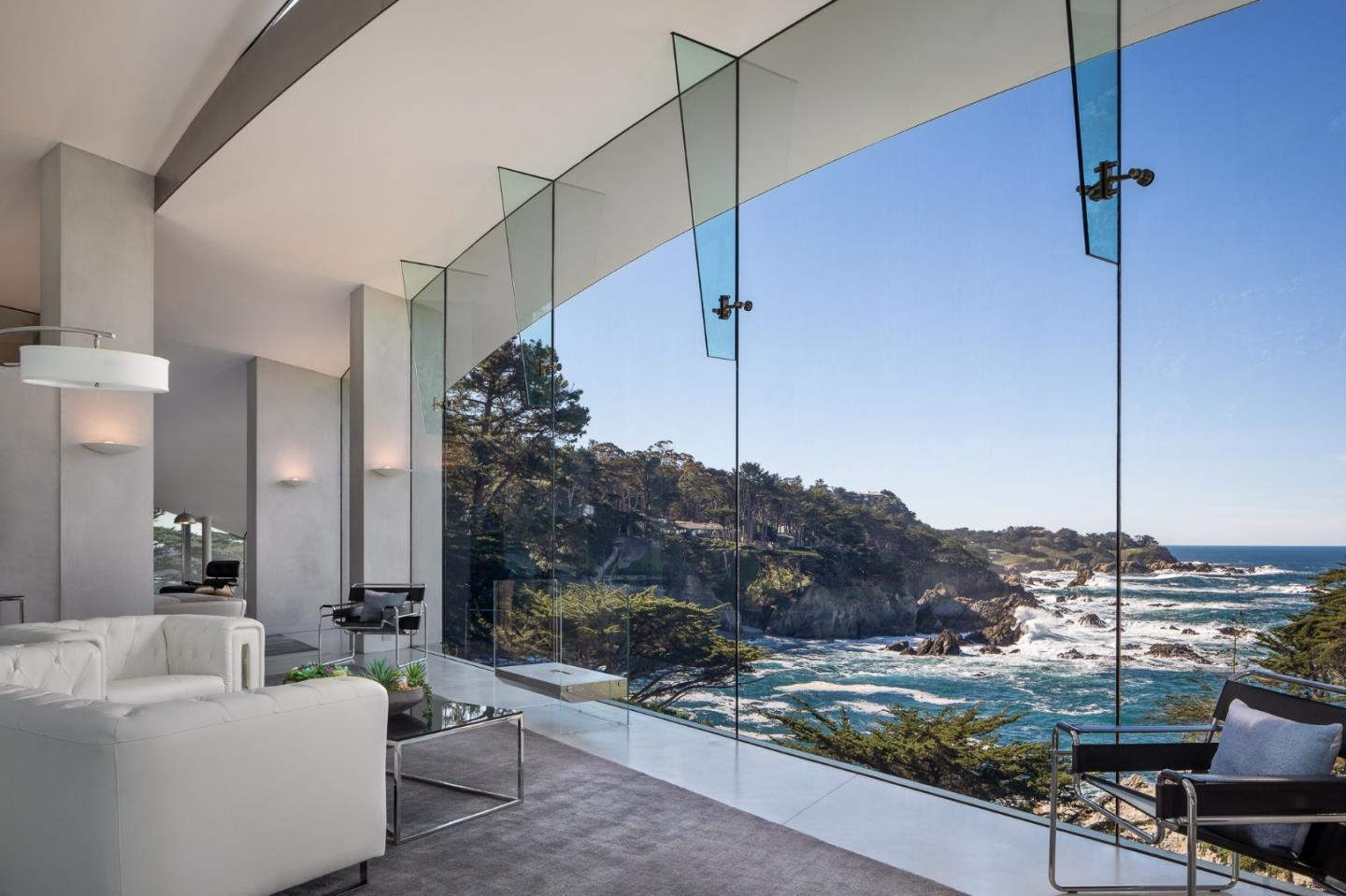 243 Highway 1 Carmel, CA 93923 - Photo 16 of 20 a living room with furniture and a floor to ceiling window