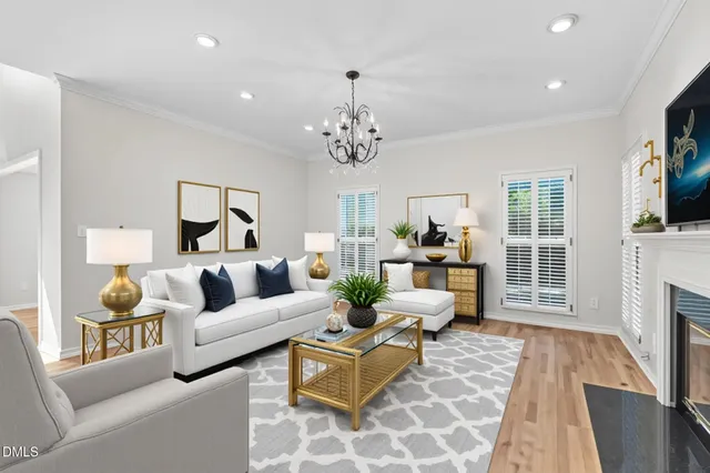 a kitchen with granite countertop a sink stainless steel appliances and white cabinets