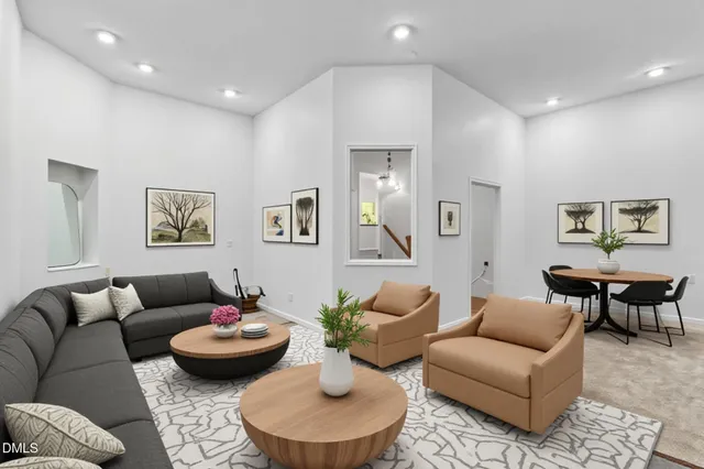 a spacious bedroom with a bed and a couch