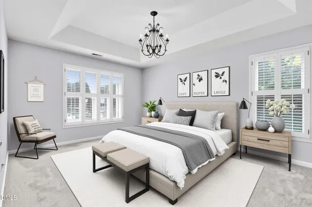 a bedroom with a bed and a couch