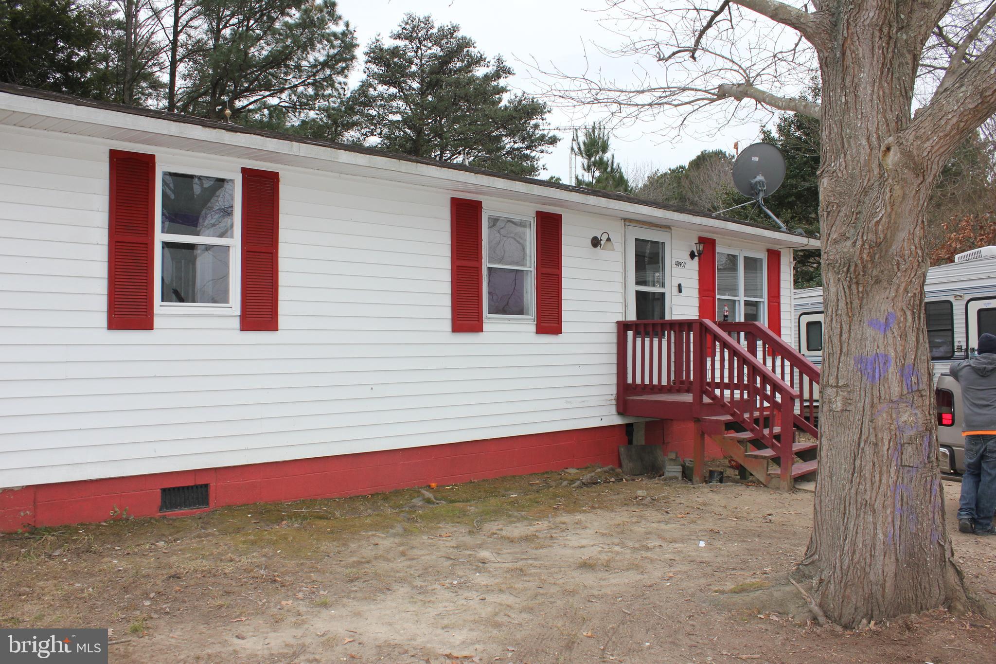 48907 Chisleytown Road St. Inigoes, MD 20684 - Photo 7 of 8 a view of a house with a yard