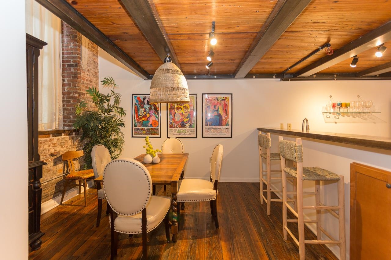 50 Gayoso Avenue, Unit 306 Memphis, TN 38103 - Photo 14 of 25 a view of a chairs and table in a patio