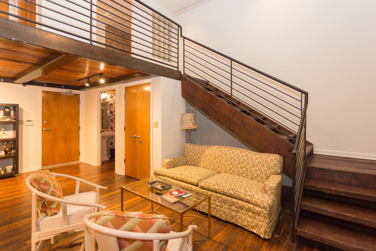50 Gayoso Avenue, Unit 306 Memphis, TN 38103 - Photo 18 of 25 a view of a room with wooden floor and windows