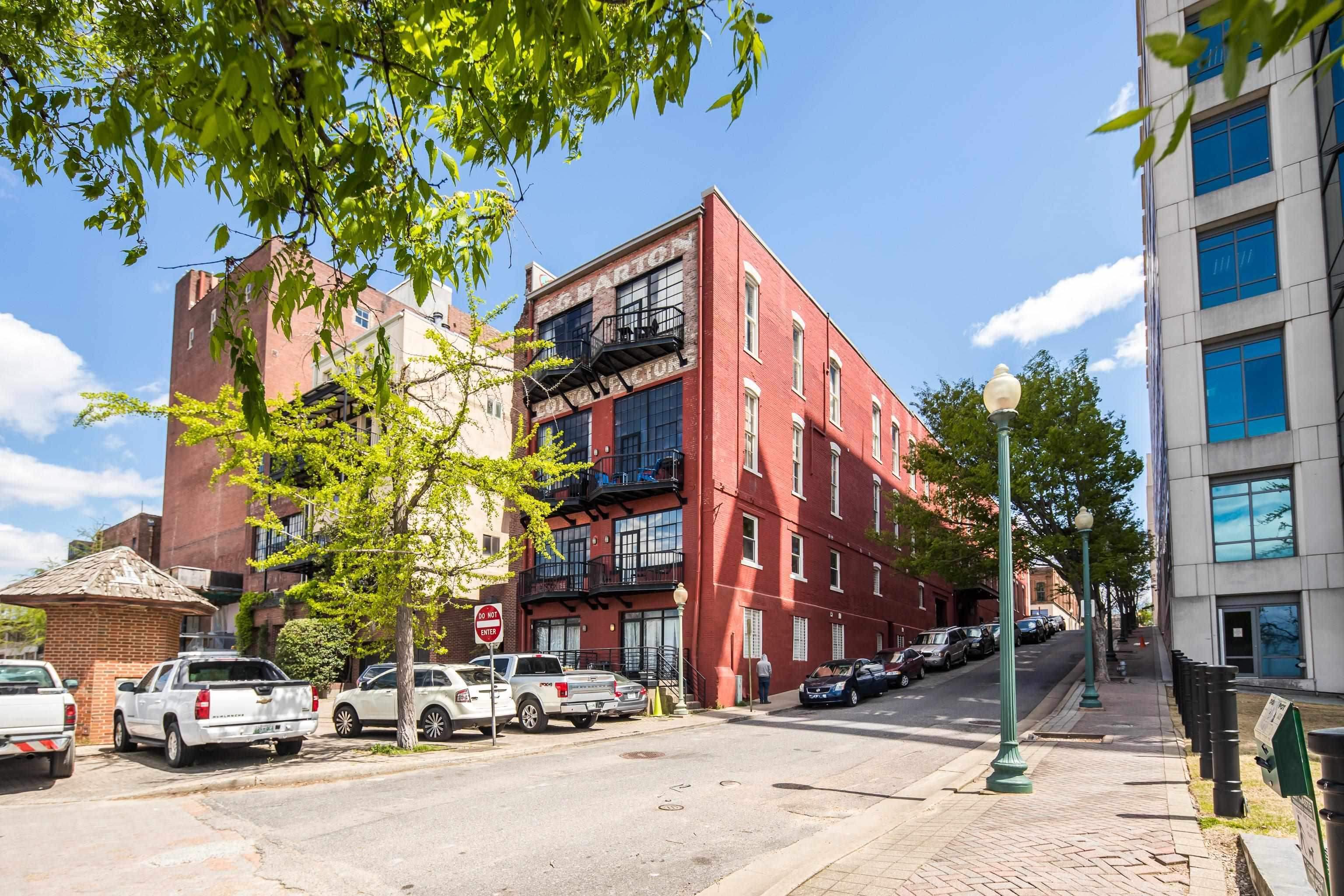 50 Gayoso Avenue, Unit 306 Memphis, TN 38103 - Photo 2 of 25 a car parked in front of a building
