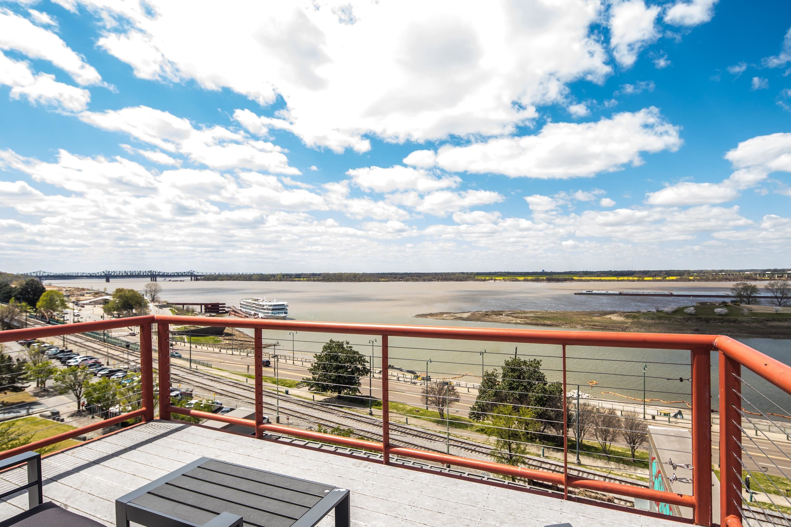 50 Gayoso Avenue, Unit 306 Memphis, TN 38103 - Photo 6 of 25 a view of a balcony next to a yard