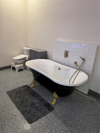 a living room with a couch and a table