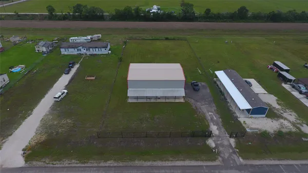 an aerial view of a house with a garden