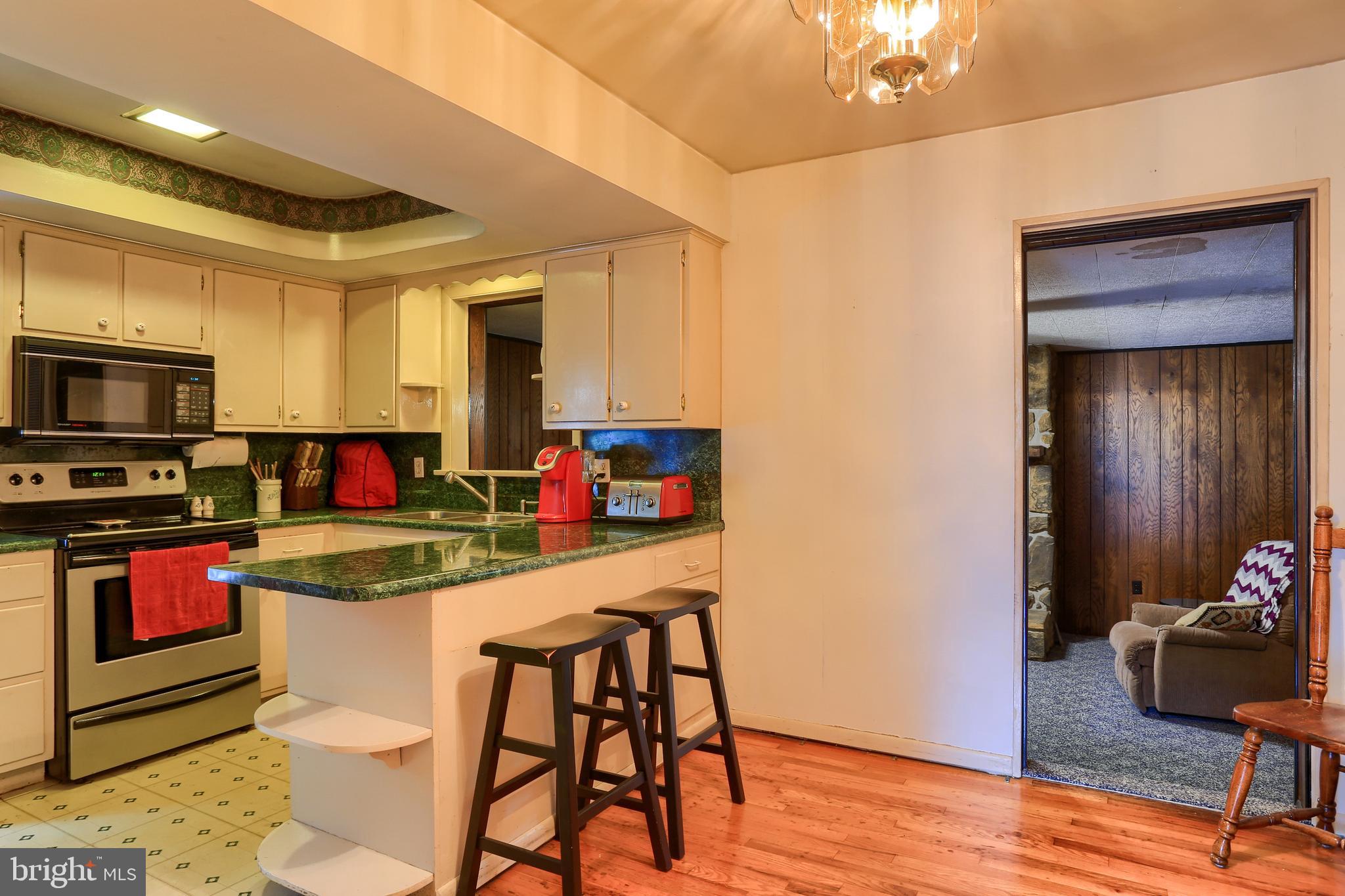 509 Big Bend Road Lancaster, PA 17603 - Photo 8 of 24 Eat-in kitchen with hardwood floors