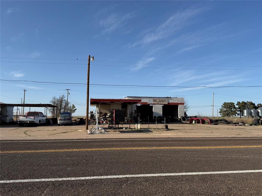 731 East G Street Munday, TX 76371 - Photo 2 of 2 a view of a building with a street